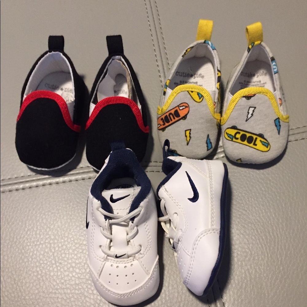 Bundle of infant shoes.  So adorable